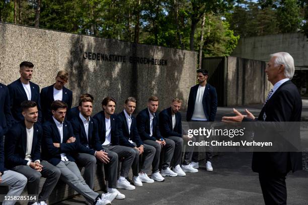 Vice President Rainer Bonhof of Borussia Moenchengladbach talks to the team during the Team of Borussia Mönchengladbach visiting the Bergen-Belsen...