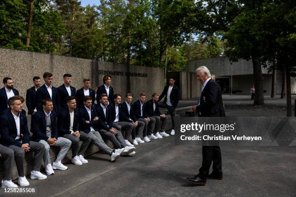 Vice President Rainer Bonhof of Borussia Moenchengladbach talks to the team during the Team of Borussia Mönchengladbach visiting the Bergen-Belsen...