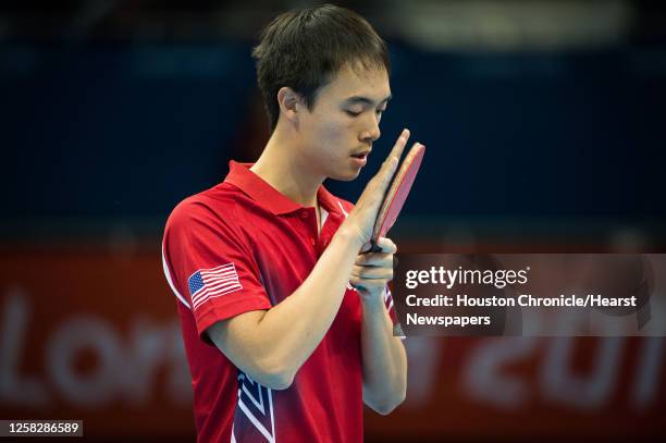 Timothy Wang of Houston prepares to face Kim Song Nam of the People's Republic of Korea in the men's singles preliminary round of table tennis at the...