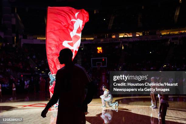 Houston Rockets shooting guard James Anderson is seen in silohuette before an NBA basketball game against the Portland Trail Blazers at Toyota Center...