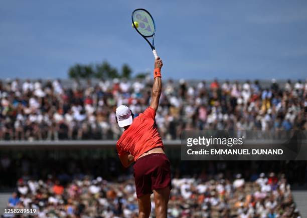 South Africa's Lloyd Harris serves to Germany's Alexander Zverev during their men's singles match on day three of the Roland-Garros Open tennis...