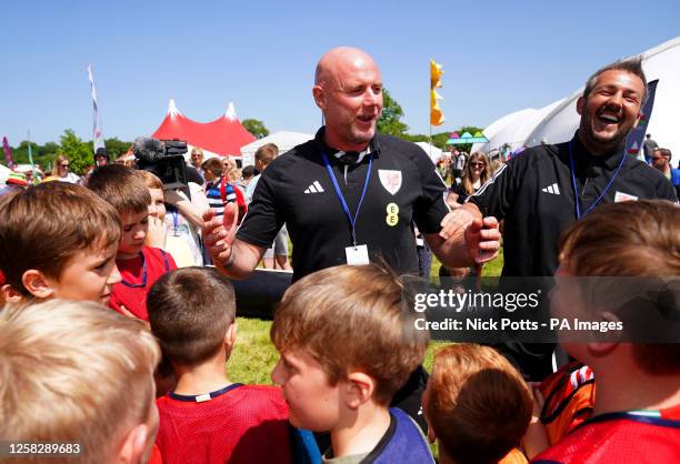 Wales manager Rob Page speaks to children following the Wales Squad Announcement at the Urdd National Eisteddfod in Llandovery, Wales. Picture date:...
