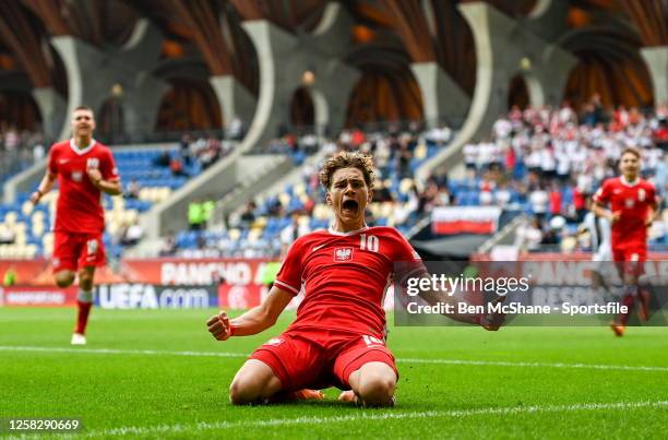 Daniel Mikoajewski of Poland celebrates after scoring his side's first goal during the UEFA European Under-17 Championship Finals 2023 semi-final...