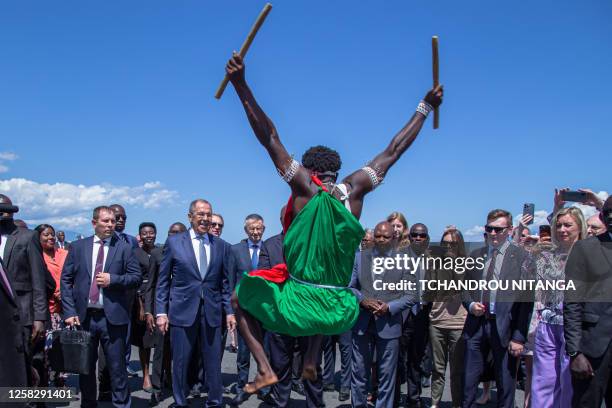 Russian Foreign Minister Sergei Lavrov and Burundi foreign minister and international cooperation Albert Nshingiro look on as Lavrov is welcomed by...