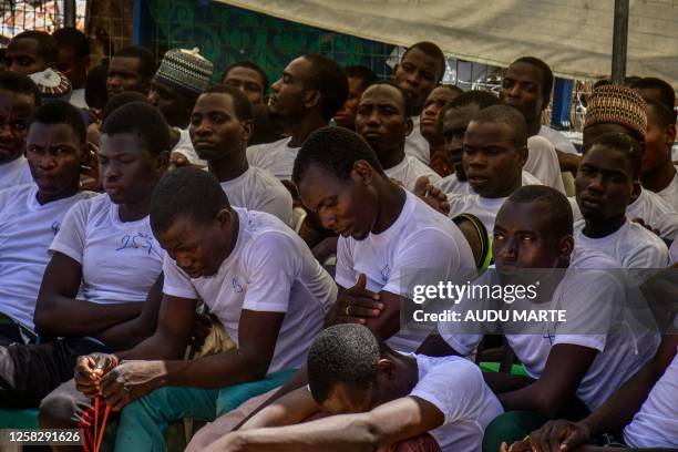 Some of the 2100 former members of Boko Haram and of the Islamic State West Africa Province are seen at the Hajja Camp in Maiduguri, Nigeria, on May...