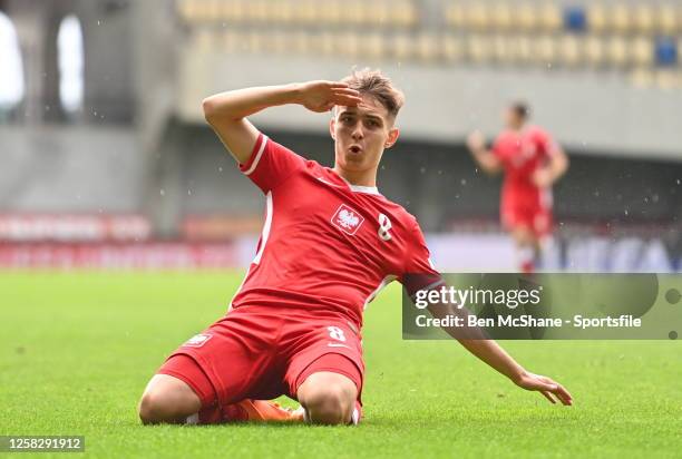 Karol Borys of Poland celebrates after scoring his side's second goal during the UEFA European Under-17 Championship Finals 2023 semi-final match...