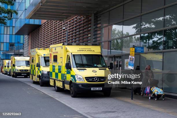 Ambulances from both privately owned companies and the London Ambulance Service waiting in line outside the Royal London Hospital in Whitechapel on...