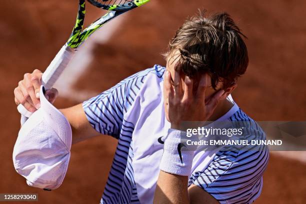 Denmark's Holger Rune gestures as he plays against US Christopher Eubanks during their men's singles match on day three of the Roland-Garros Open...