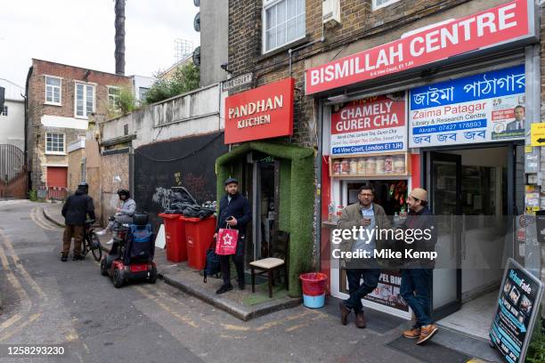 Street scene looking down Vine Court just off Whitechapel High Street on 25th May 2023 in London, United Kingdom. Whitechapel is an ethnically...