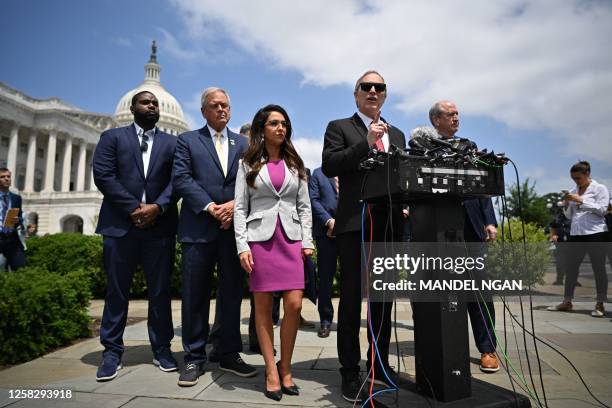 Representative Andy Biggs , joined by members of the House Freedom Caucus, speaks on the debt limit deal outside the US Capitol in Washington, DC, on...