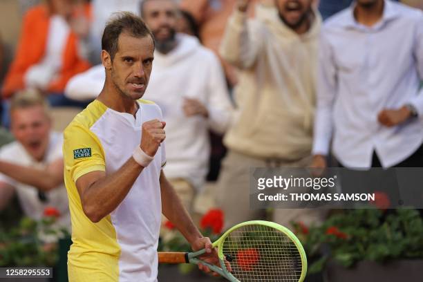 France's Richard Gasquet reacts after a point against France's Arthur Rinderknech during their men's singles match on day three of the Roland-Garros...