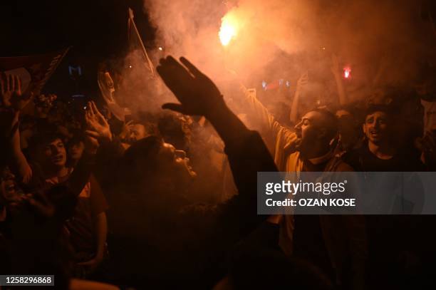 Galatasaray's supporters celebrate their 2022-2023 champion title in Istanbul on May 30 at the end of the Turkish Super league football match between...