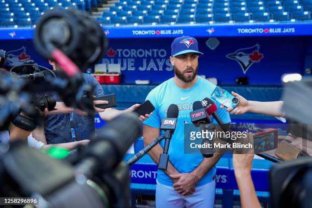 Anthony Bass of the Toronto Blue Jays makes a statement to the media before playing the Milwaukee Brewers in their MLB game at the Rogers Centre on...