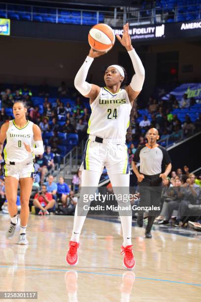 Arike Ogunbowale of the Dallas Wings shoots the ball during the game against the Minnesota Lynx on May 30, 2023 at the College Park Center in...