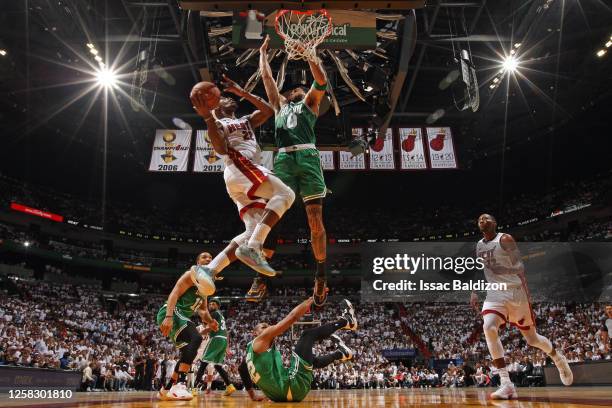 Jimmy Butler of the Miami Heat goes to the basket during Game 6 of the 2023 NBA Playoffs Eastern Conference Finals against the Boston Celtics on May...