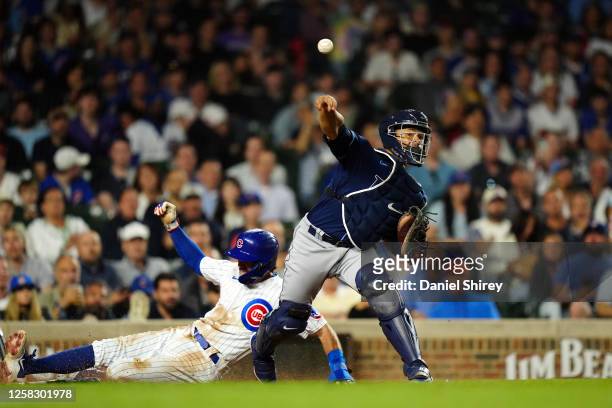 Francisco Mejía of the Tampa Bay Rays turns a double play at home during the eighth inning of the game between the Tampa Bay Rays and the Chicago...
