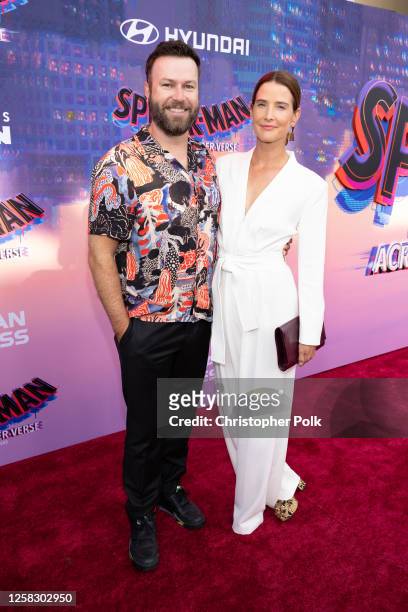 Taran Killam and Cobie Smulders at the premiere of "Spider-Man: Across the Spider-Verse" held at Regency Village Theatre on May 30, 2023 in Los...