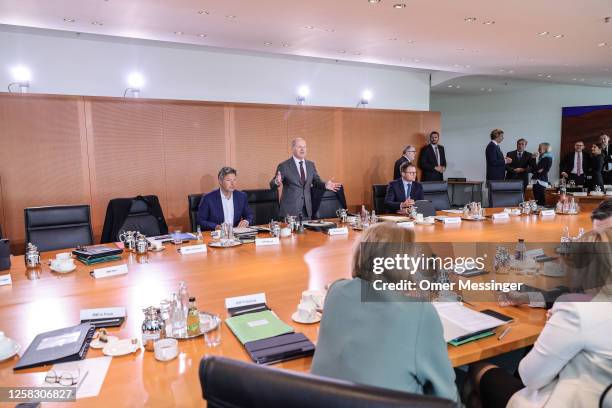 German Chancellor Olaf Scholz declares the beginning of the weekly federal government cabinet meeting next to German Federal Minister for Economic...