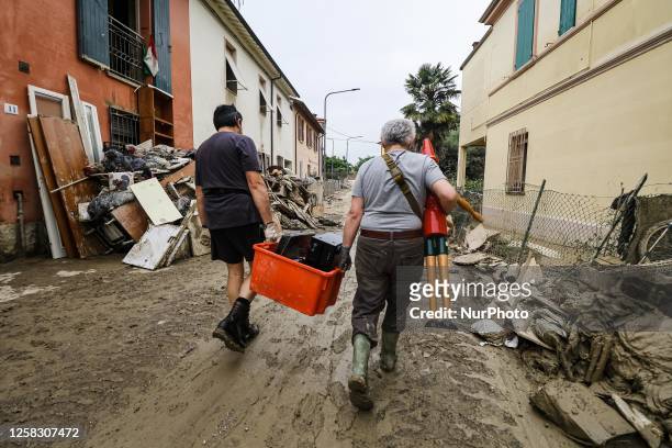 General view of volunteers at work and the flood damage in Emilia Romagna on May 31, 2023 in Faenza, Italy
