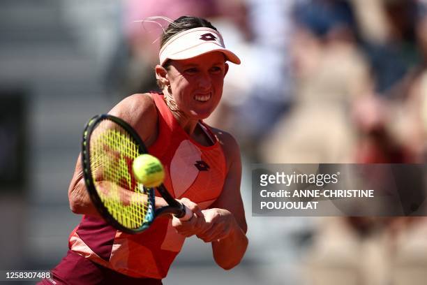 Australia's Storm Hunter plays a backhand return to Ukraine's Elina Svitolina during their women's singles match on day four of the Roland-Garros...