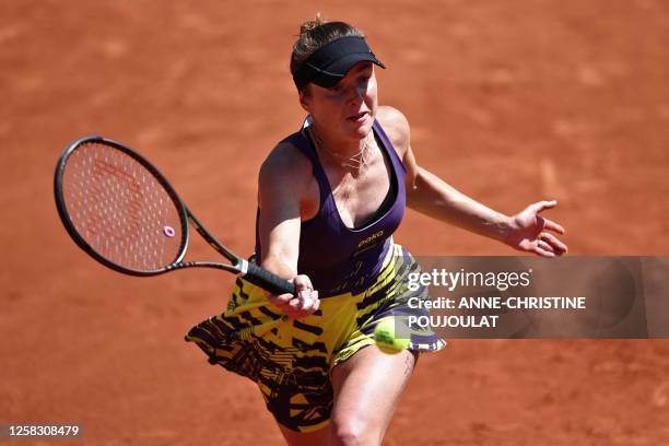 Ukraine's Elina Svitolina plays a forehand return to Australia's Storm Hunter during their women's singles match on day four of the Roland-Garros...