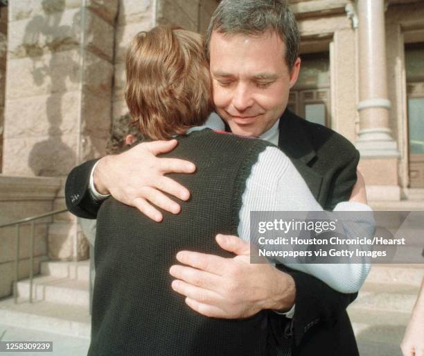 Dana Brown, husband of death row inmate Karla Faye Tucker, is hugged by a supporter during the rally Saturday, Jan. 17 in Austin, Texas. Tucker is...