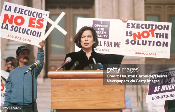 Bianca Jagger talks to the media and execution opponents during a rally at the state Capitol in Austin to abolish Texas' death penalty and plead for...