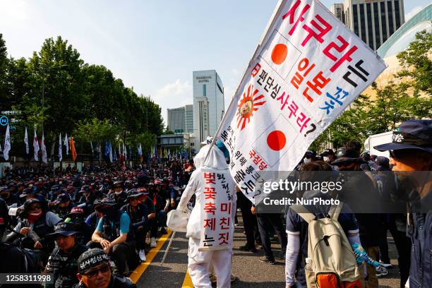 Members from the Korean Confederation of Trade Unions participate in a protest against of the government's labor policies on May 31, 2023 in Seoul,...