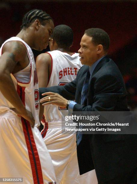 S head coach Ray McCallum talks to his player, #20, Andre Owens in the first period, during the University of Houston-Prairie View basketball game at...