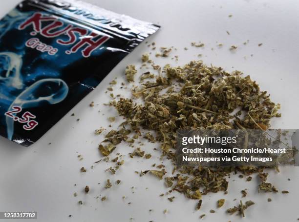 Three packages of Kush, which is basically synthetic marijuana sold in some smoke shops and other stories in Houston and other parts of the United...
