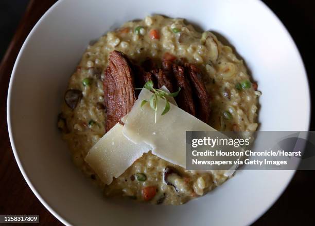 The Andean Risoto dish created by Roberto Castre, chef of Latin Bites Cafe in the Galleria neighborhood, photographed Tuesday, Nov. 19 in Houston.