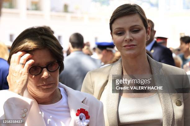 Stephanie of Monaco and princess Charlene of Monaco arrive for the inauguration of the sculpture walk as part of the celebrations to mark the birth...