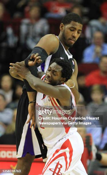 Houston Rockets point guard Patrick Beverley battles against Sacramento Kings power forward Jason Thompson during the first half of an NBA basketball...