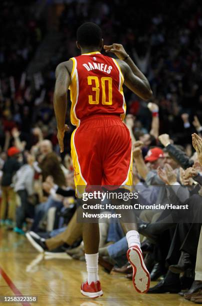 Houston Rockets guard Troy Daniels celebrates his three-pointer during the second half of an NBA basketball game at Toyota Center, Thursday, Dec. 18...