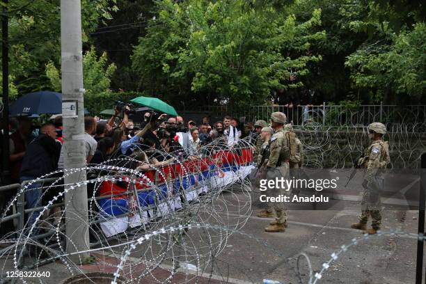 International Military Mission to Kosovo take measures as protests remain calm in Zvecan on May 31, 2023 in Zcevan, Kosovo. At least 30 soldiers of...