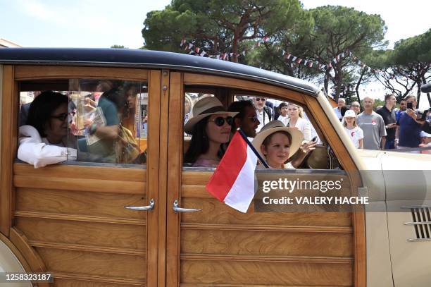 Tatiana Santo Domingo and Andrea Casiraghi and other members of the royal family parade in vintage cars as part of the celebrations to mark the birth...