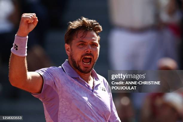 Switzerland's Stan Wawrinka celebrates a point against Australia's Thanasi Kokkinakis during their men's singles match on day four of the...