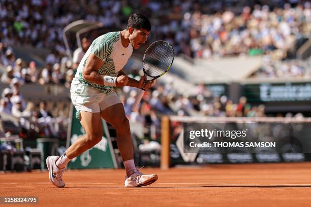 Spain's Carlos Alcaraz Garfia reacts as he plays against Japan's Taro Daniel during their men's singles match on day four of the Roland-Garros Open...