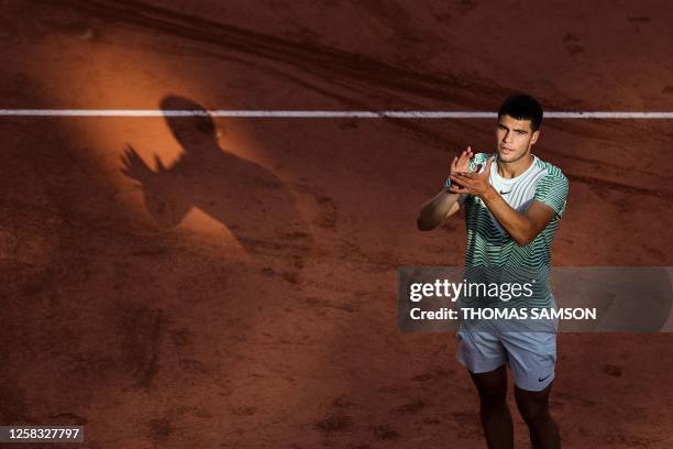 Spain's Carlos Alcaraz Garfia celebrates after winning against Japan's Taro Daniel at the end of their men's singles match on day four of the...