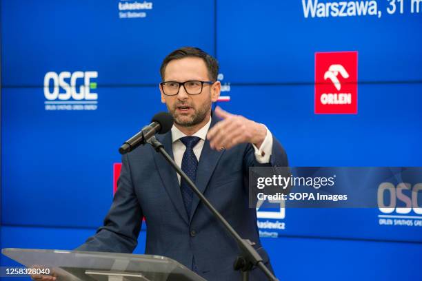 The president of Orlen Polish Oil Company - Daniel Obajtek speaks during a press conference. In Warsaw, during a press conference, the Minister of...