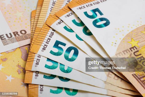 Symbolic photo on the subject of cash. 50 euro banknotes lie on a table on May 31, 2023 in Berlin, Germany.