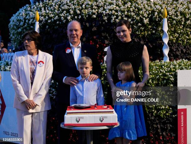 Princess Stephanie of Monaco , Prince Albert II of Monaco , Princess Charlene , and Prince Jacques and Princess Gabriella pose for a photograph in...