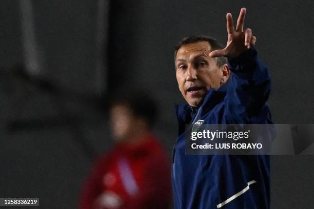 Italy's coach Carmine Nunziata gives instructions to his players during the Argentina 2023 U-20 World Cup round of 16 football match between England...