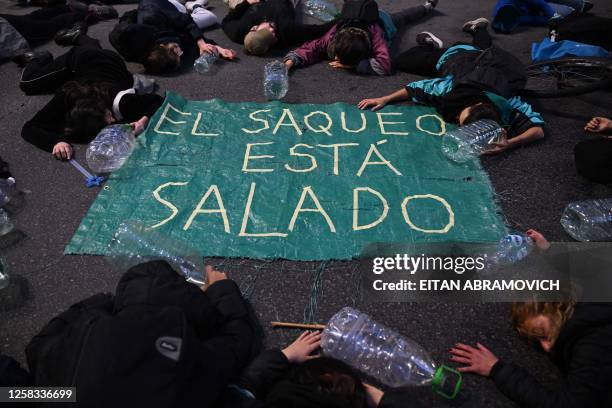 People take part in a protest called by Uruguay's Central Union in "defense of water" against the handling of the national authorities with respect...