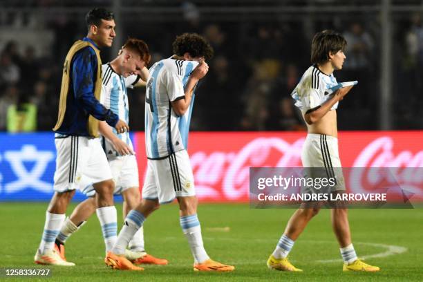 Argentina's players react after losing against Nigeria during the Argentina 2023 U-20 World Cup round of 16 football match between Argentina and...