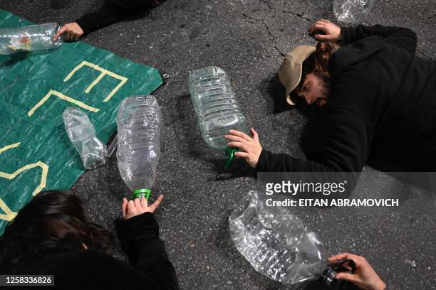 People take part in a protest called by Uruguay's Central Union in "defense of water" against the handling of the national authorities with respect...