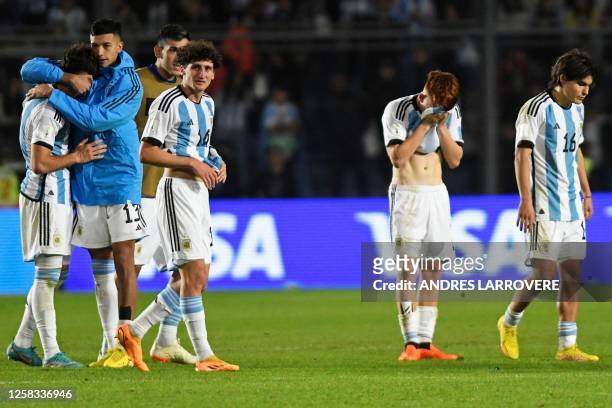 Argentina's players react after losing against Nigeria during the Argentina 2023 U-20 World Cup round of 16 football match between Argentina and...