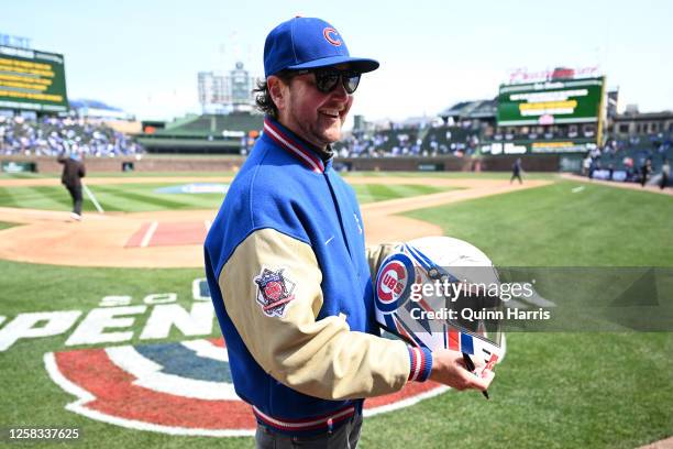 Nascar driver Kurt Busch poses before the game during the game between the Milwaukee Brewers and the Chicago Cubs at Wrigley Field on Thursday, March...