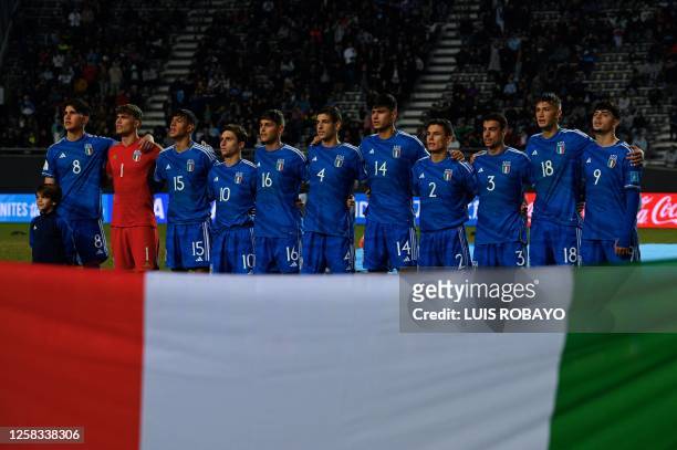 Italy players sing the national anthem before the start of the Argentina 2023 U-20 World Cup round of 16 football match between England and Italy at...
