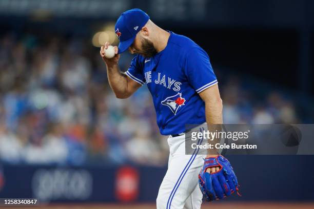Anthony Bass of the Toronto Blue Jays pitches in the ninth inning of their MLB game against the Milwaukee Brewers at Rogers Centre on May 31, 2023 in...